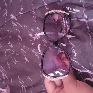 Black sunglasses with bling on them